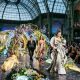 Models walk the runway at the Grand Palais during Paris Fashion Week Spring/Summer 2027, surrounded by an elaborate custom set installation.