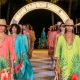 Models walking the runway at Miami Fashion Week 2026 in vibrant tropical-inspired looks